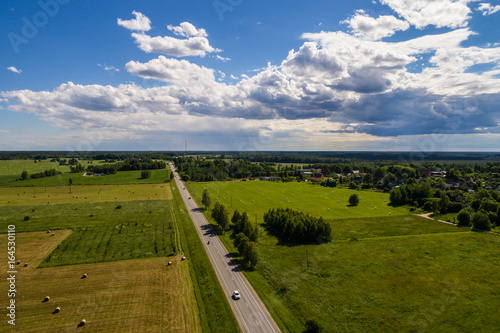 Aerial panorama of amazing summer landscape. Fields and meadows from above.
