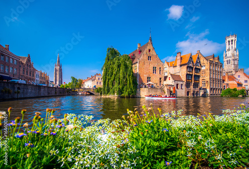 View from the Rozenhoedkaai in Brugge with the Perez de Malvenda house and Belfort van Brugge in the background in day light