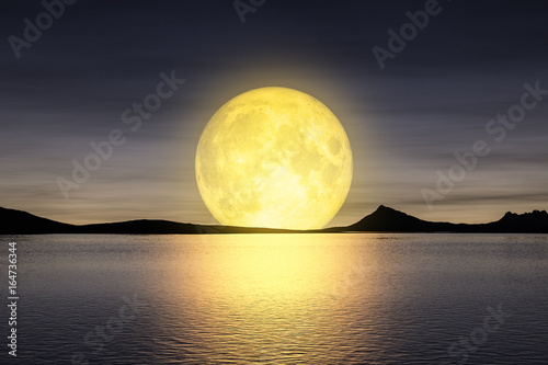 moon rising over the sea