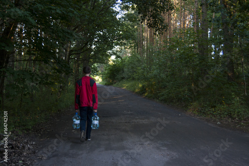 Men walking with water