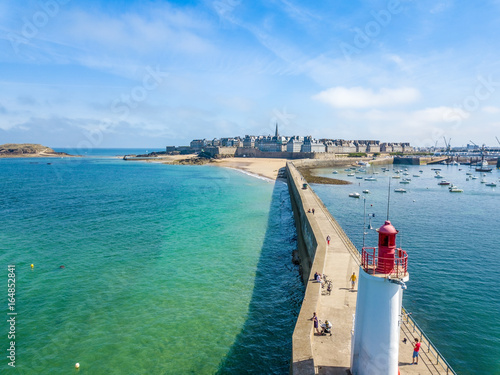 Aerial postcard of Saint Malo in Brittany France with a Lighthouse in the foreground