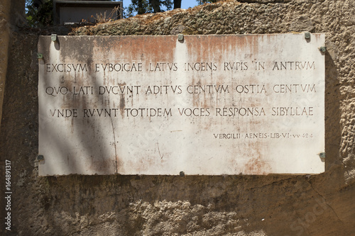 Inscription of virgilio on marble, acropolis of cumae, pozzuoli.