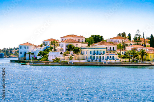 Buildings of Spetses island on Saronic gulf near Athens. Ideal travel destination for quiet vacations . Greece