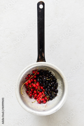 Seasonal fruits on a colander