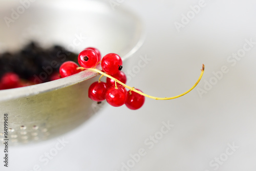 Seasonal fruits on a colander