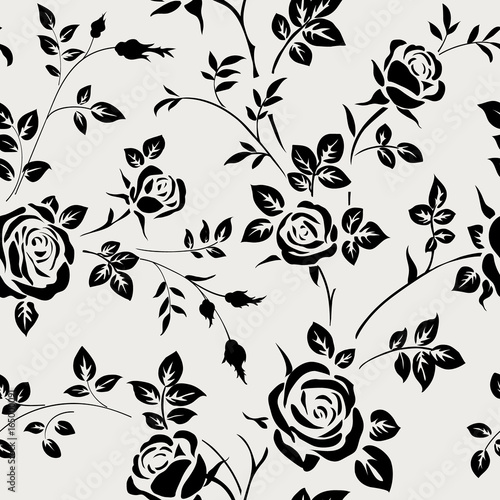Seamless pattern with black rose silhouette on white background. Floral wallpaper