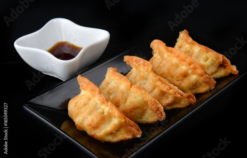 Deep fried gyoza crispy and golden colour.