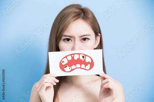 woman take tooth billboard