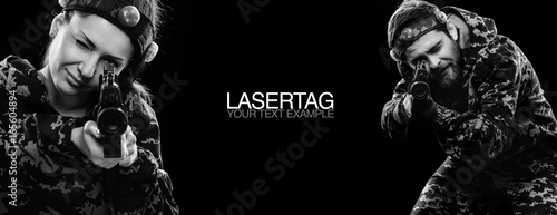 Paintball game and lasertag soldiers in military isolated on black background. Poster concept with copy space. Sport concept.