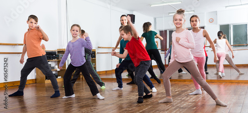Young children studying contemp dance