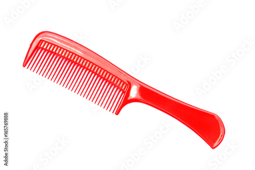 Red comb on white background