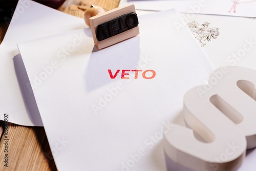 Law act with red veto stamp.