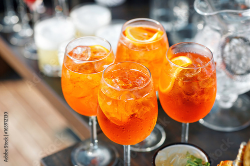 Aperol spritz cocktail in misted glass, selective focus