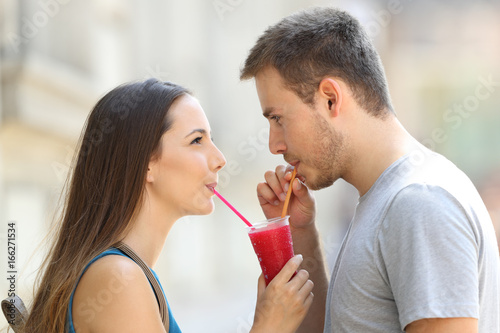 Couple sipping a slush together