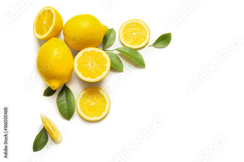 Composition of delicious citrus fruit and green leaves on white background