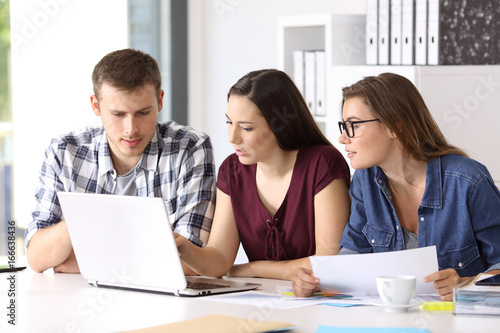 Entrepreneurs coworking at office