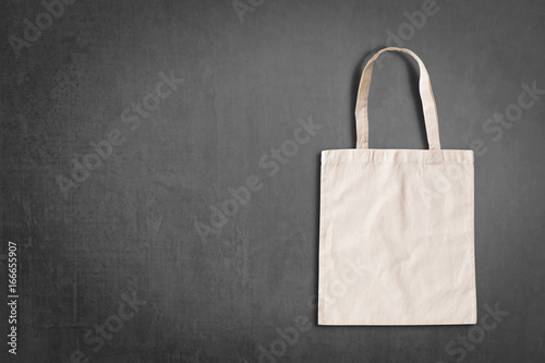Tote bag fabric cloth shopping sack mockup isolated on black chalkboard copryspace (clipping path)