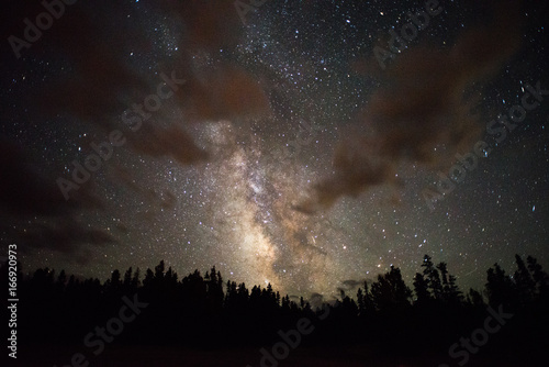 Cloudy view of the Milky Way photographed from the Rocky Mountains in Wyoming