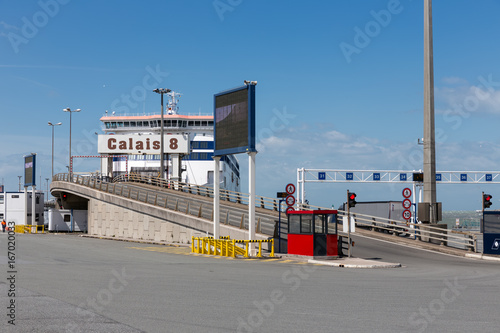Ferry to England moored at harbor gate in Calais, France