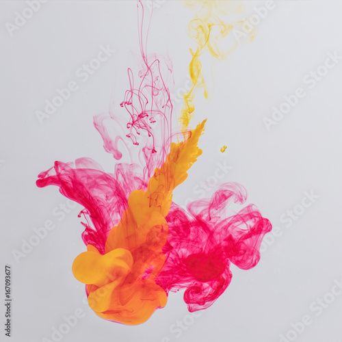 Colorful acrylic ink in water.