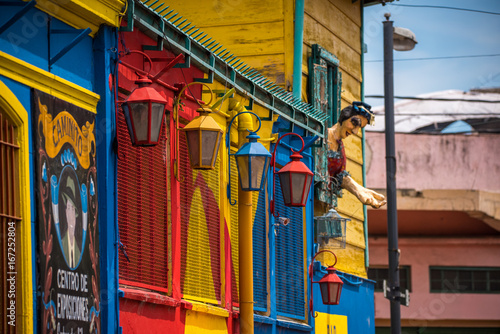 Street iron lanterns are painted in different colors. Shevelev.