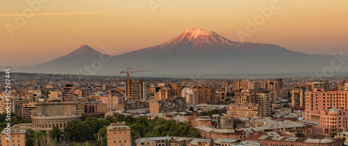 City skyline of Yerevan at sunrise, with Mt Ararat in background
