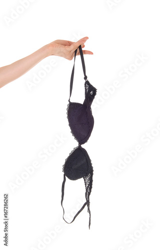 Woman's hand holding a black bra