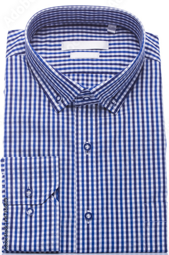 Man's shirt blue on a white background. Vertical