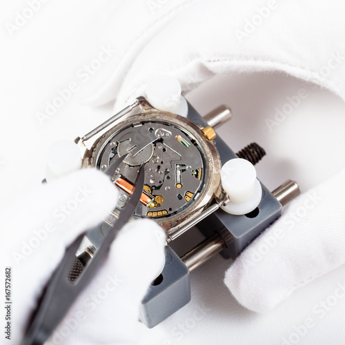 replacing battery in quartz wristwatch close up