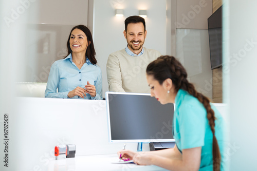 Patients consulting the dentist at dental clinic