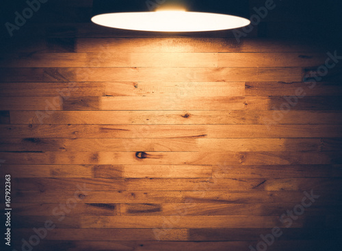 big lamp and wooden pallet wall, vintage tone with vignett