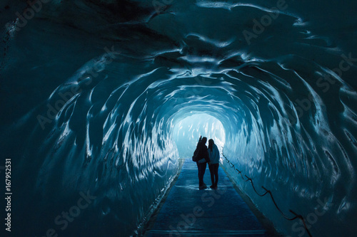 Ice cave Mer de Glace in France with two people