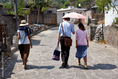 Missionaries in Guatemala / Evangelizers of Holy Bible going from house to house preaching publically
