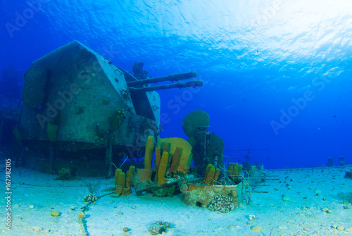 a gun turret on the shipwreck of the captain keith tibbetts. This underwater relic is on a russian destroyer that was aquired from Cuba to be sunk deliberately in little cayman for scuba divers