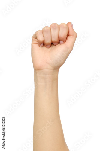 Female hand showing wrong fist gesture isolated on white