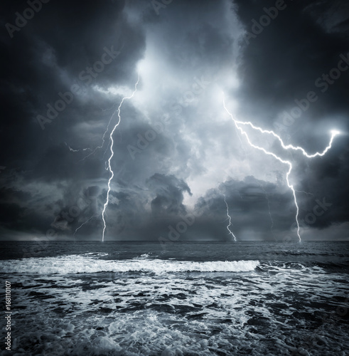 dark ocean storm with lgihting and waves at night