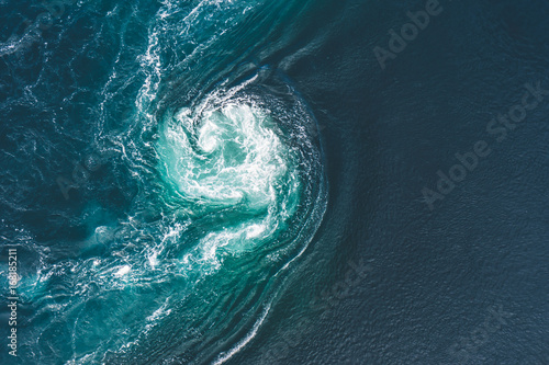 Whirlpools of the maelstrom of Saltstraumen, Nordland, Norway . Saltstraumen is a small strait with one of the strongest tidal currents in the world. B y Letowa.