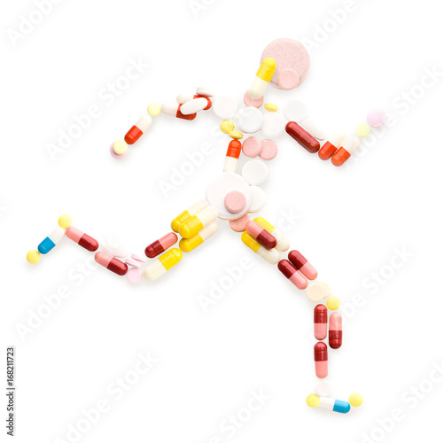 Running fast / Creative medicine and healthcare concept, doping drugs and pills in the shape of an athletic runner on track.