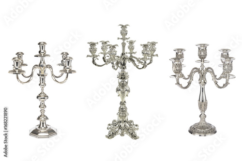 Three candelabra white background.