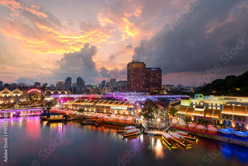 Colorful light building at night in Clarke Quay, Singapore. Clarke Quay, is a historical riverside quay in Singapore.