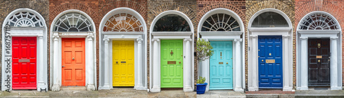 Panoramic rainbow colors collection of typical irish georgian doors of Dublin, Ireland