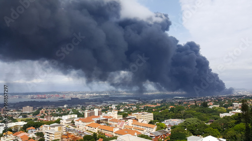 Environmental Disaster in Durban: Toxic Black Clouds Engulf Sky in Smoke Pollution Crisis.
