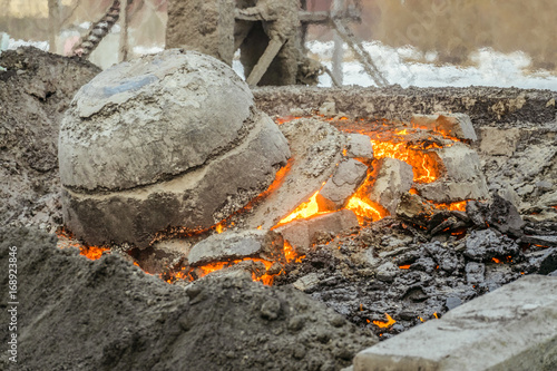 Molten incandescent hot slag in slag dump. Wastes from the metallurgical industry.