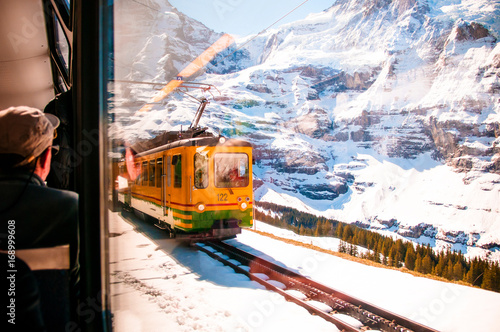 Yellow train of wengernalpbahn at Kleine Scheidegg station, Jungfrau