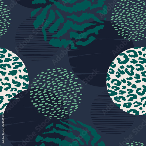 Abstract geometric seamless pattern with animal print and circles.