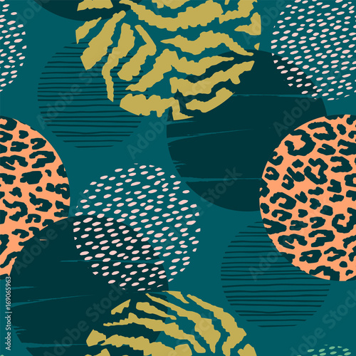 Abstract geometric seamless pattern with animal print and circles.