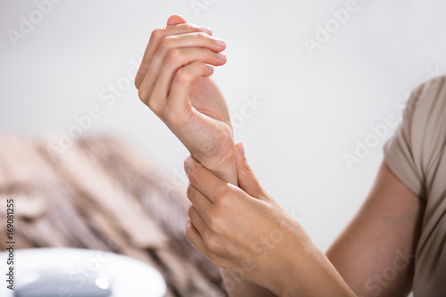 Businessperson Holding Painful Wrist