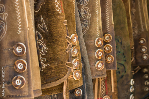 Traditional austrian and bavarian leather pants (lederhosen), closeup of buttons