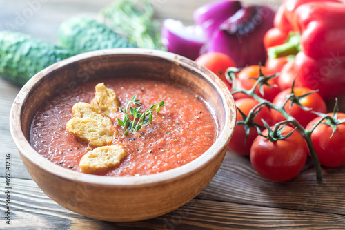 Bowl of gazpacho on the wooden table