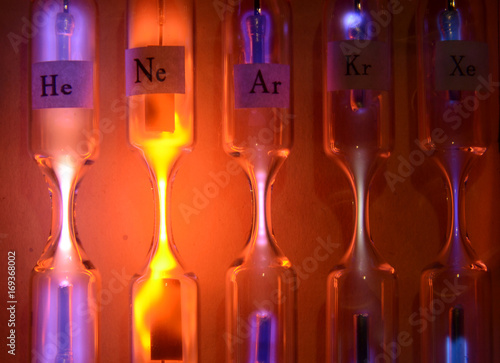 Tubes with inert gases excited with high voltage. From left to right: Helium, Neon, Argon, Krypton and Xenon. Each tube emits a different color and intensity.